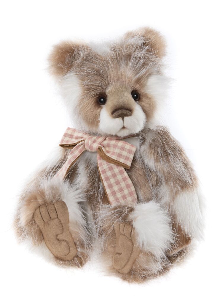 Kielder is a 5 jointed bear and wears a smart gingham and faux suede bow around his neck